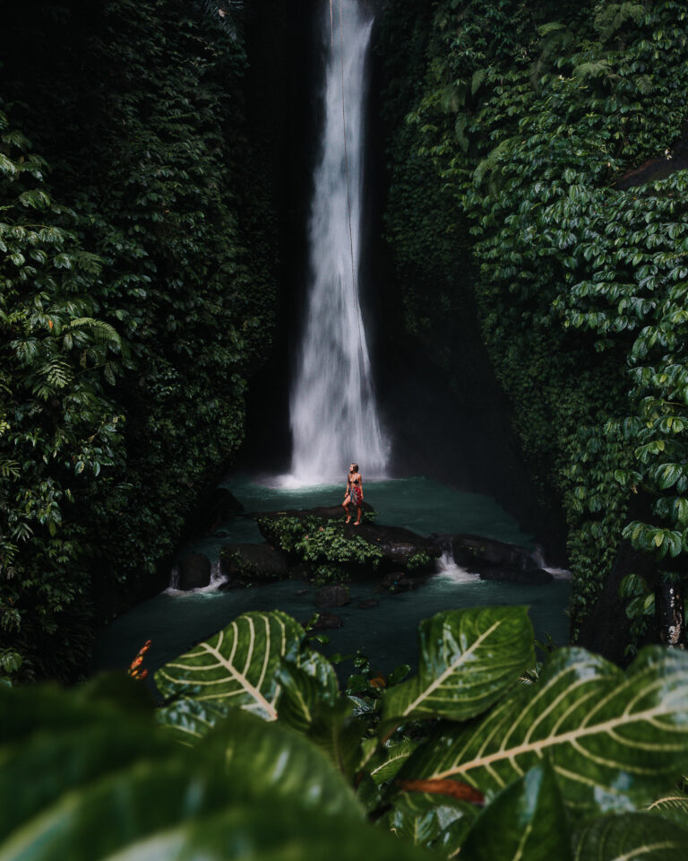 Bree stands at the foot of Leke Leke waterfall