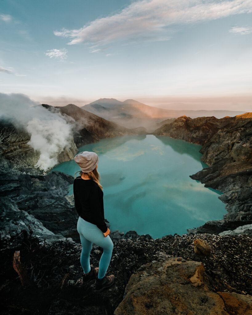 Bree stands looking out at the Ijen crater in Indonesia