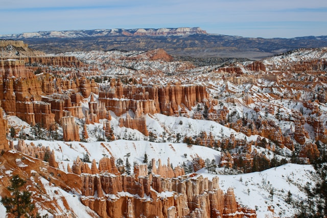 The red rocks of Bryce Canyon are covered in snow