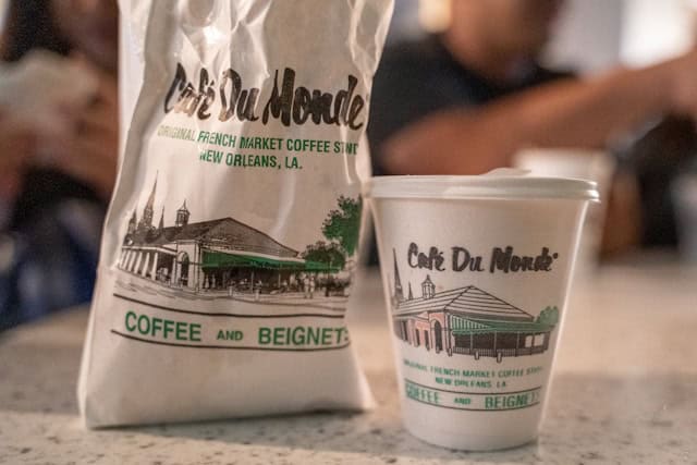 coffee cup and bag of beans from Cafe Du Monde